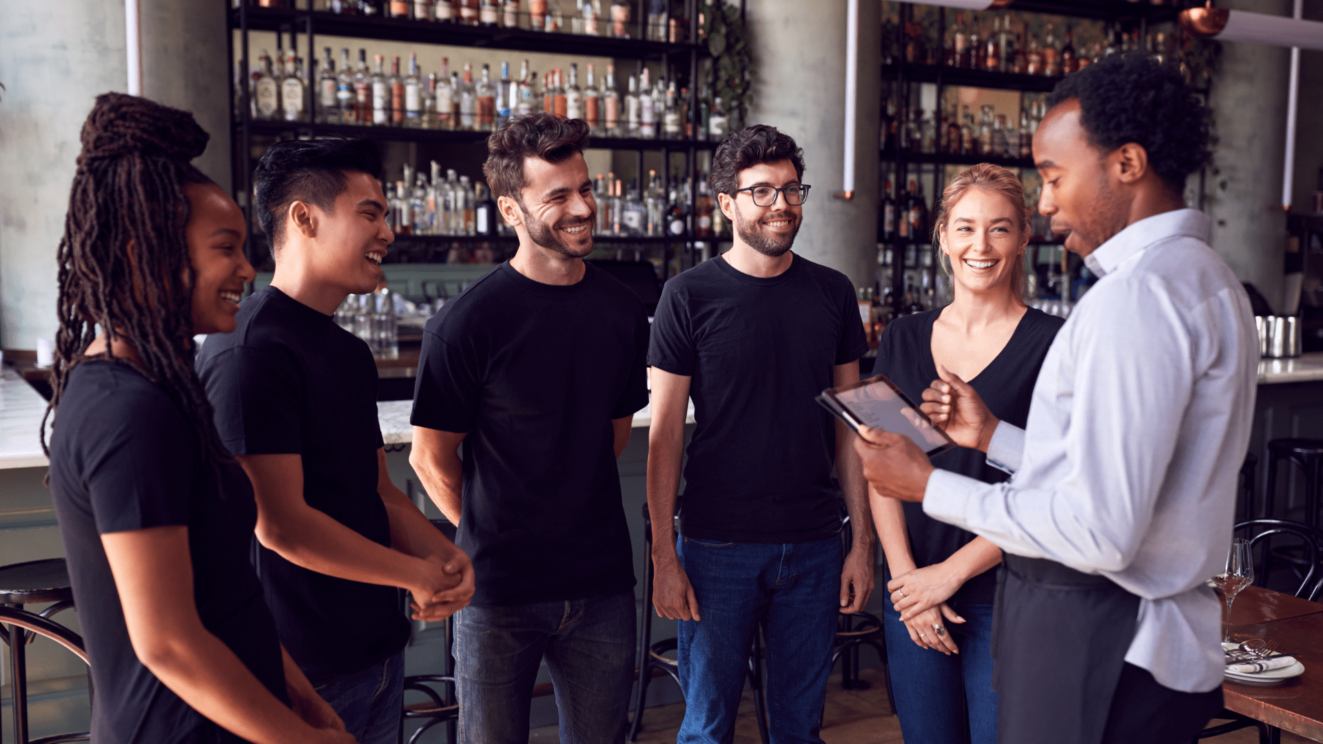 Hospitality team meeting in a bar